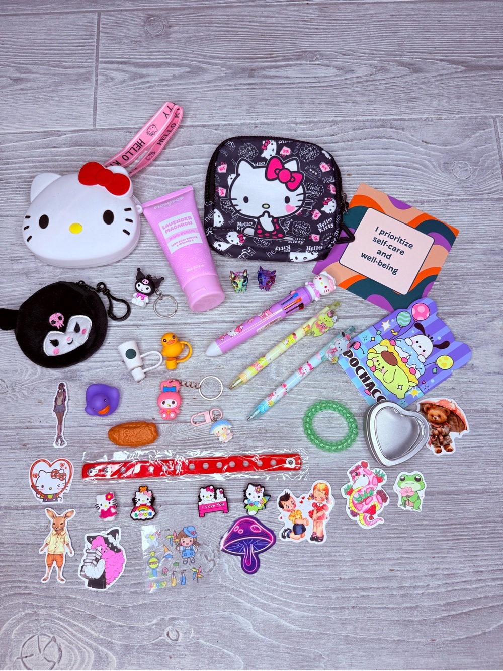 Hello kitty purse , coin purse bundle , stickers ,  pens , straw caps , keychain